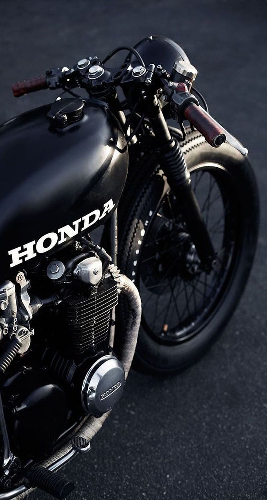 Black Honda Cafe Racer Motorcycle Close-Up with Matte Tank and Spoked Wheels HD phone wallpaper