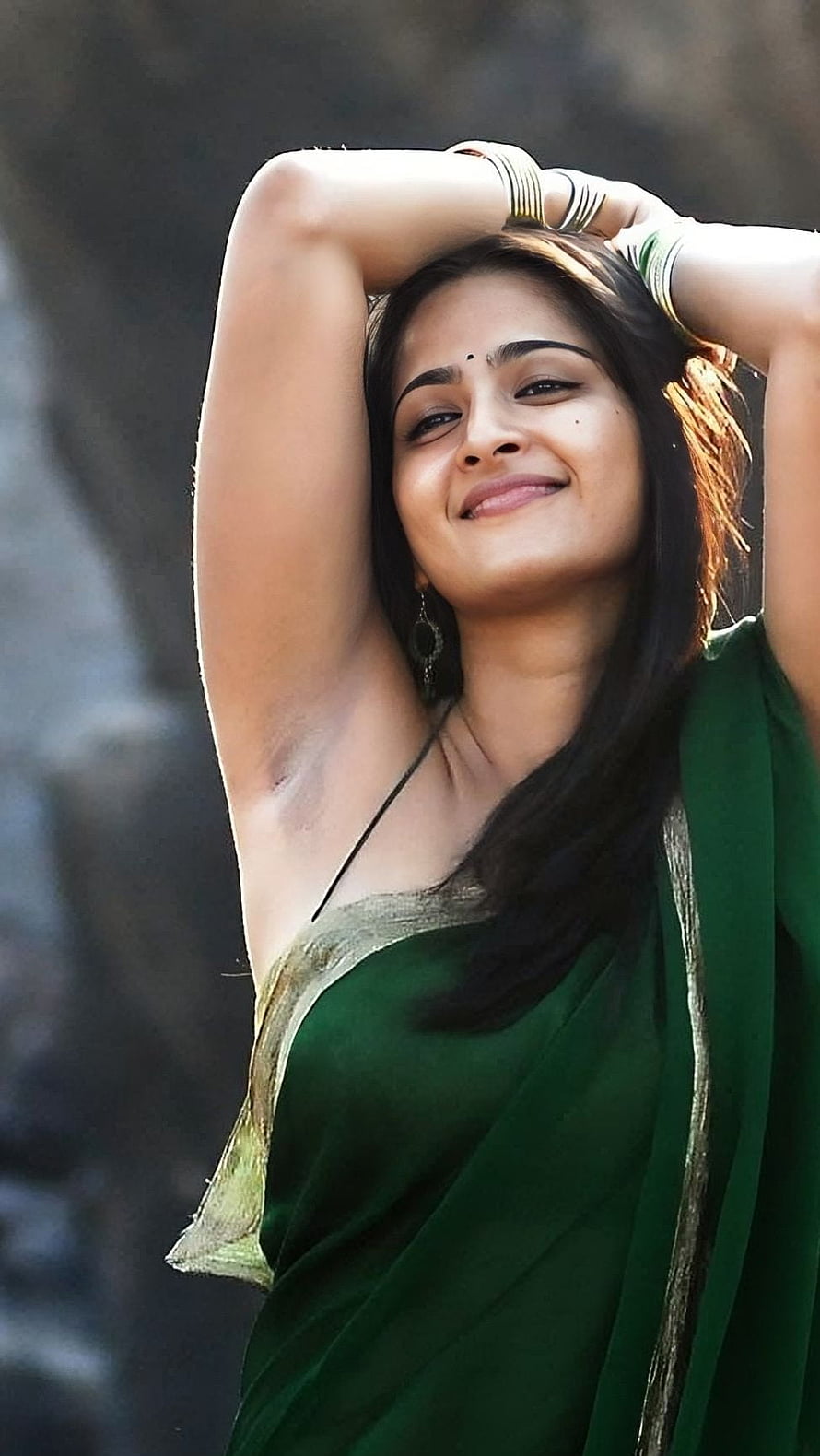 Anushka Shetty in a Green Saree with Gold Border and Traditional Bangles HD phone wallpaper