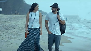 Kalyani Priyadarshan and Pranav Mohanlal Walking on Beach in Hridayam HD wallpaper