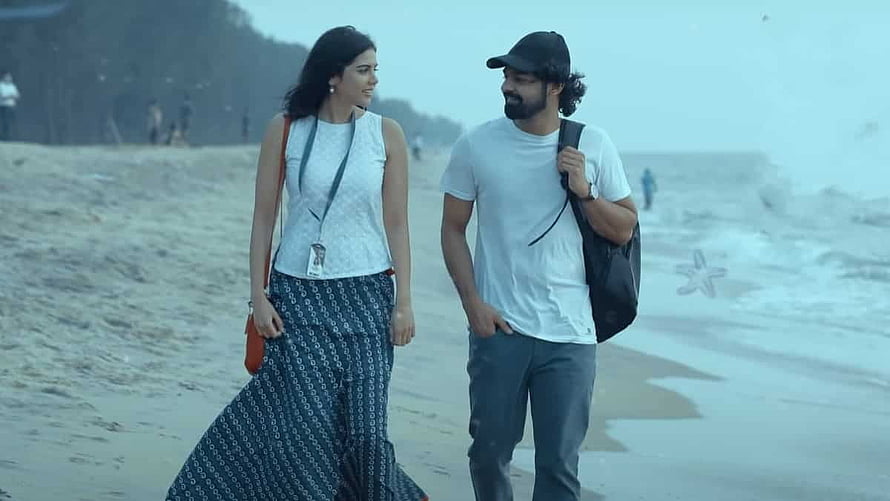 Kalyani Priyadarshan and Pranav Mohanlal Walking on Beach in Hridayam HD wallpaper