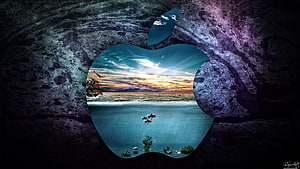 Apple Logo Framing Underwater Ocean Scene With Sunset Sky And Swimming Fish HD wallpaper
