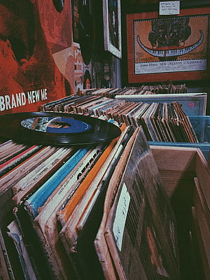 Vintage Vinyl Record Collection in Retro Music Store with 80s Aesthetic HD phone wallpaper