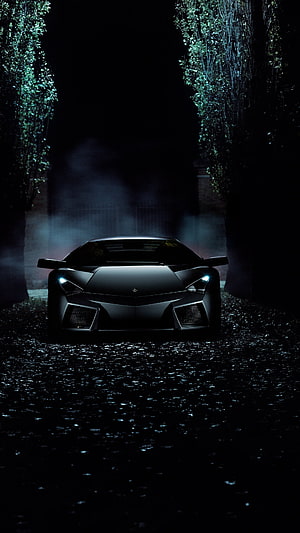 Matte Black Lamborghini Aventador Front View in Dark Misty Forest Setting HD phone wallpaper