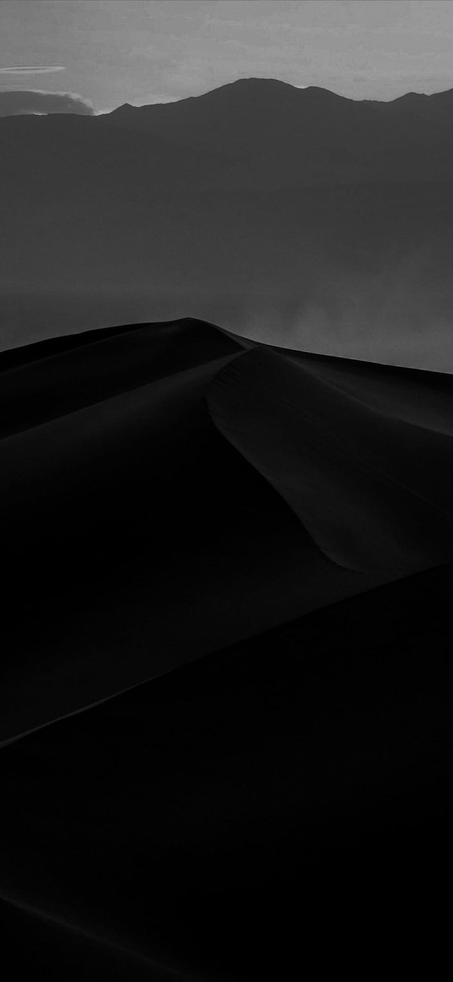 Monochromatic Black Sand Dunes with Distant Mountain Silhouettes in Minimalist Landscape HD phone wallpaper