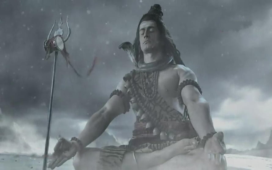 Lord Shiva Meditating in Cosmic Storm with Trishula and Snake Adornment HD wallpaper