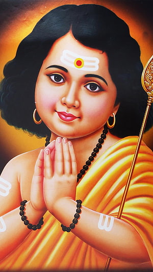 Murugan Devotional Portrait in Traditional Attire with Prayer Gesture and Golden Scepter HD phone wallpaper