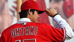 Shohei Ohtani in Los Angeles Angels Red Jersey and Cap HD wallpaper