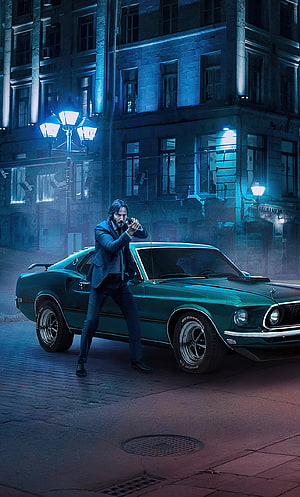 John Wick Aiming Pistol Beside Green Ford Mustang in Moody Night Street Scene HD phone wallpaper