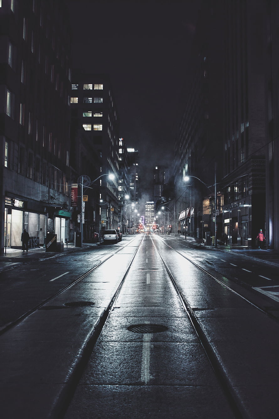 Moody Night Street in Toronto with Wet Asphalt and Glowing Streetlights HD phone wallpaper