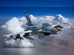 TNI AU Fighter Jet in Flight with Air-to-Air Missiles and Fuel Tanks HD wallpaper