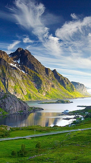 Scenic Fjord Landscape with Steep Green Mountains and Calm Water HD phone wallpaper