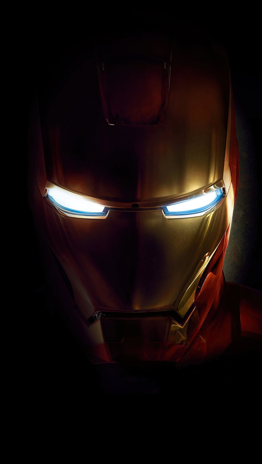 Iron Man Helmet Close-Up with Glowing Blue Eyes in Dramatic Dark Lighting HD phone wallpaper