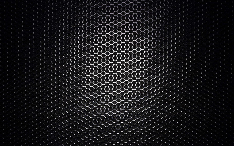 Dark Hexagonal Metal Mesh with Central Spotlight and Industrial Texture HD wallpaper