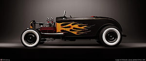 1932 Ford Roadster Hot Rod with Orange Flame Paint and White Wall Tires HD wallpaper