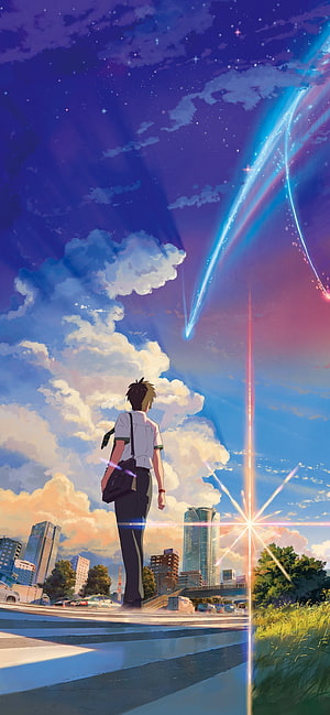 Anime Boy Gazing at Meteor Shower Over City Skyline at Twilight HD phone wallpaper