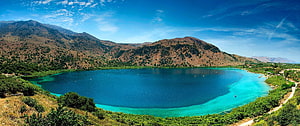 Pano Lake Panorama with Turquoise Waters and Arid Mountain Range HD wallpaper