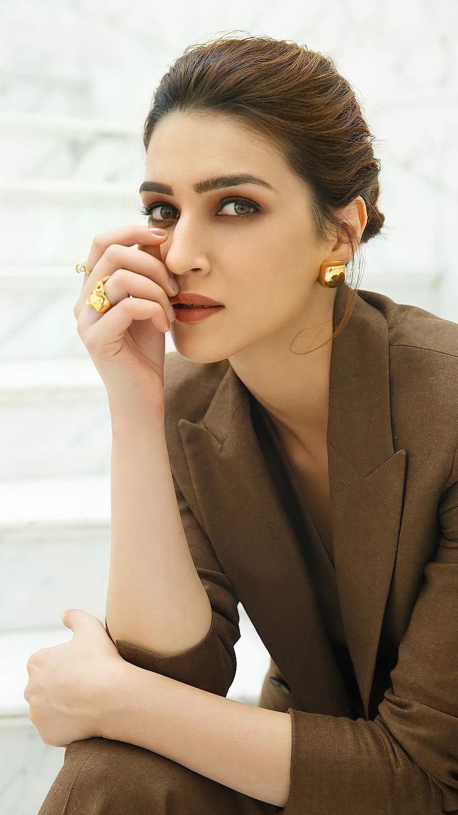 Kriti Sanon in a Brown Blazer with Gold Jewelry and Elegant Updo HD phone wallpaper