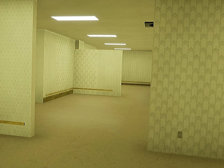 The Backrooms: Endless Yellow Office Corridor with Patterned Walls and Fluorescent Lighting HD wallpaper