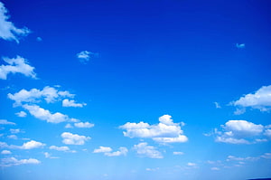 Vast Blue Sky with Scattered White Clouds and Bright Daylight HD wallpaper