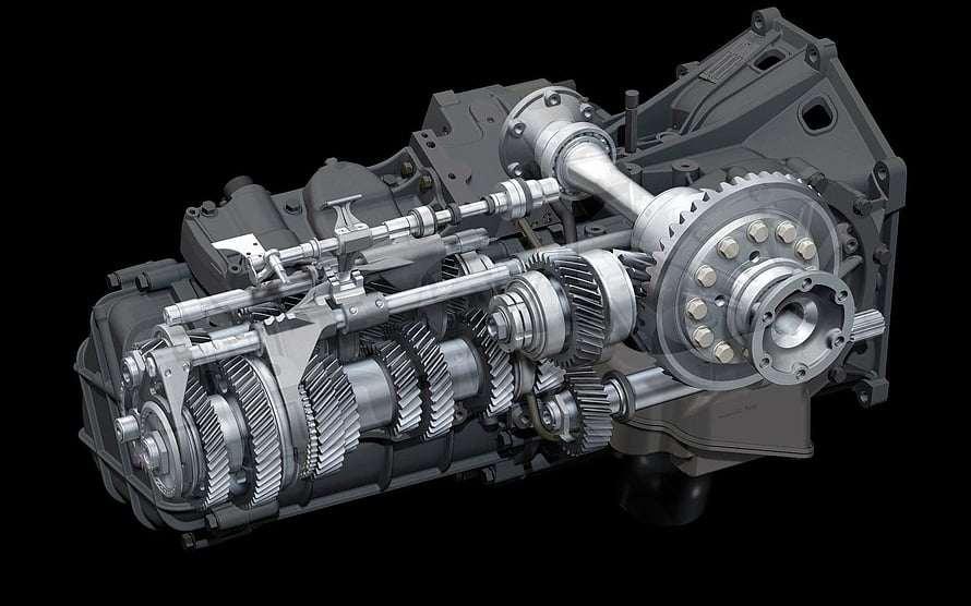 Cutaway view of a manual transmission assembly showing internal gears, shafts, and clutch mechanism HD wallpaper