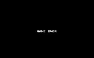 Retro Pixel Art Game Over Screen on Black Background HD wallpaper