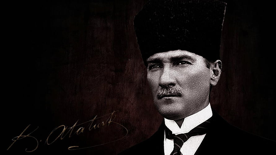 Mustafa Kemal Atatürk in Formal Attire with Signature on Dark Background HD wallpaper