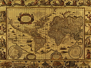 Antique World Map with Decorative Borders and Celestial Medallions HD wallpaper