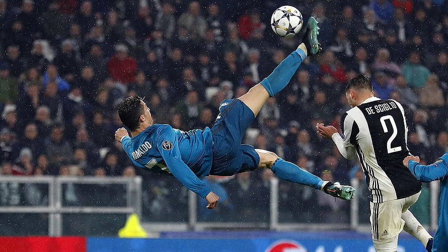Cristiano Ronaldo Bicycle Kick Action Shot in UEFA Champions League Match HD wallpaper