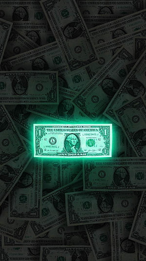 Glowing One Dollar Bill Amidst Scattered US Currency with Neon Green Glow HD phone wallpaper