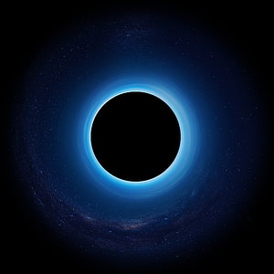 Glowing Blue Accretion Disk Surrounding a Black Hole in Deep Space HD phone wallpaper