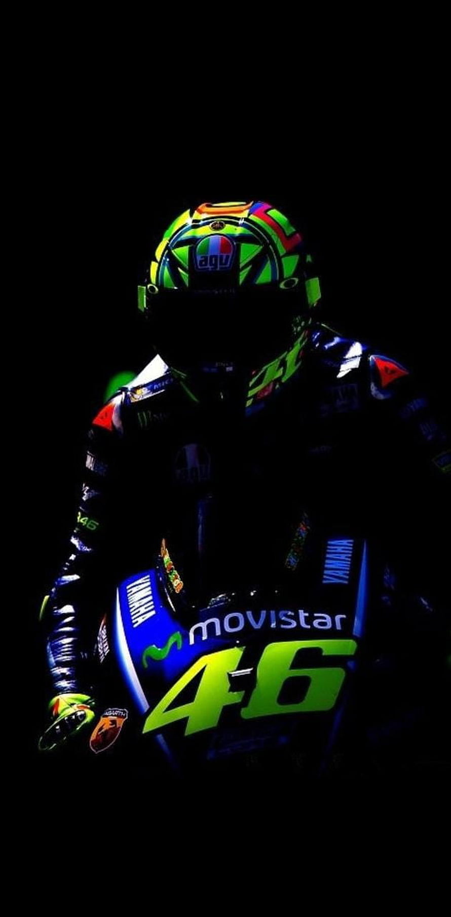 Valentino Rossi Yamaha Movistar 46 Motorcycle Racing Helmet and Suit in Dark Studio Lighting HD phone wallpaper