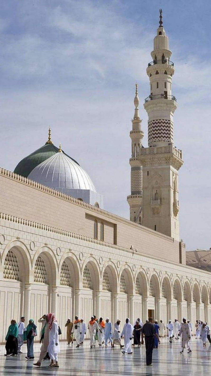 Grand Mosque Courtyard with Minarets and Green Dome Under Blue Sky HD phone wallpaper