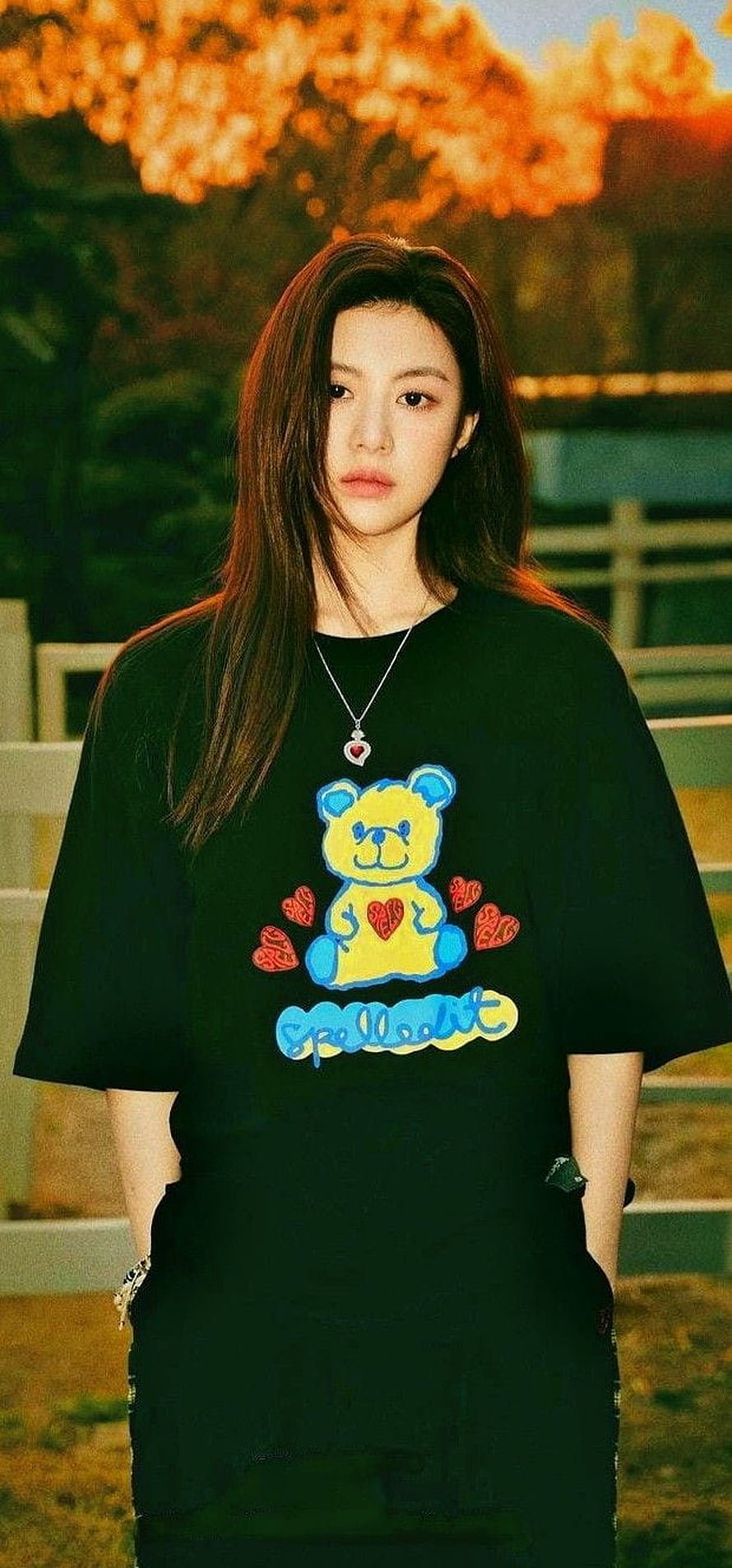 Go Yoon Jung in Black Oversized T-Shirt with Teddy Bear Graphic at Golden Hour HD phone wallpaper