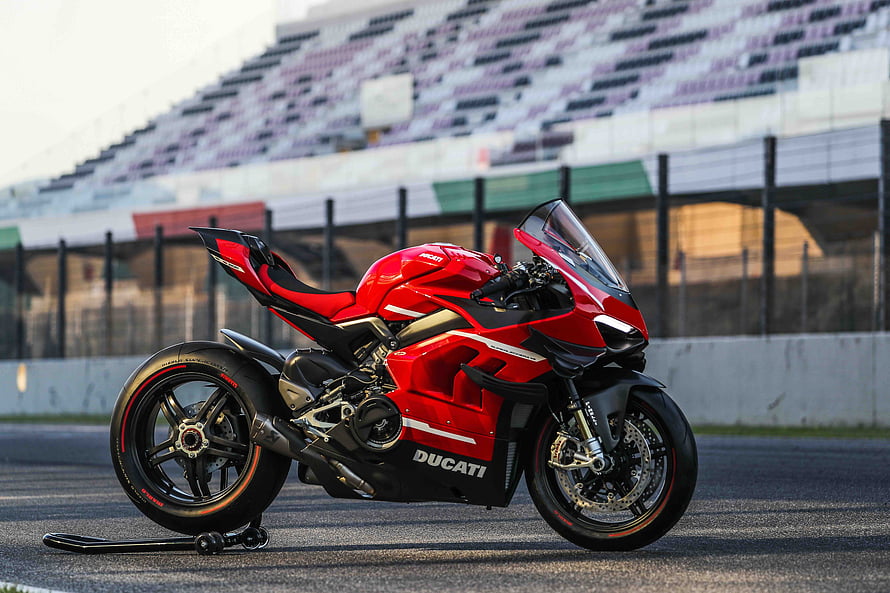 Red Ducati Superleggera V4 Superbike Parked on a Race Track HD wallpaper