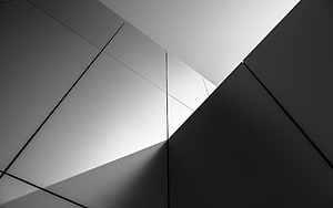 Monochrome Geometric Architecture: Minimalist Facade Lines and Angular Shadows HD wallpaper