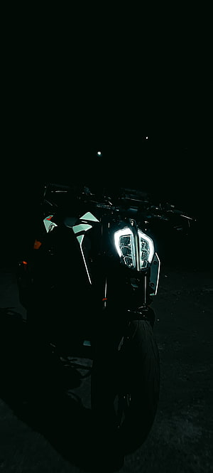 KTM Duke 390 Motorcycle Front Headlight Glow in Dark Night Setting HD phone wallpaper