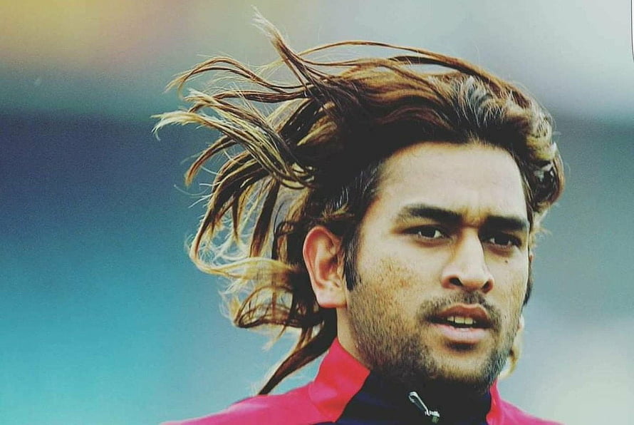 MS Dhoni Portrait With Long Flowing Hair And Intense Gaze HD wallpaper