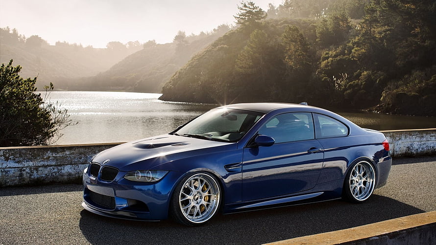 LeMans Blue BMW E92 M3 Coupe Parked on a Scenic Lakeside Road at Sunrise HD wallpaper
