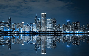 Chicago Skyline at Night with Water Reflection and Blue City Lights HD wallpaper