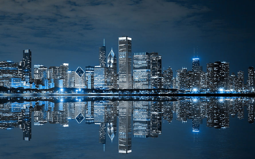 Chicago Skyline at Night with Water Reflection and Blue City Lights HD wallpaper