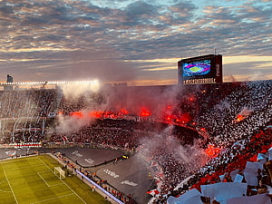 River Plate Monumental Stadium at Dusk with Flares and Confetti HD wallpaper