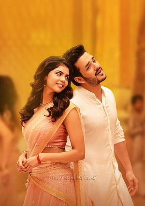 Akhil Akkineni and Kalyani Priyadarshan in traditional Indian attire for Hello movie HD phone wallpaper