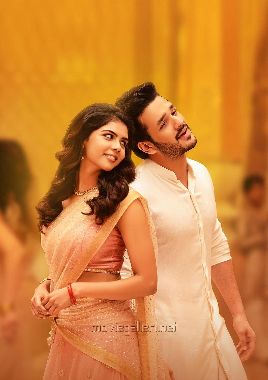 Akhil Akkineni and Kalyani Priyadarshan in traditional Indian attire for Hello movie HD phone wallpaper