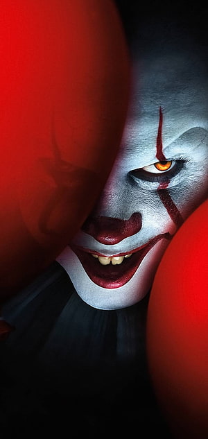 Pennywise the Dancing Clown from IT with Red Balloons and Menacing Grin HD phone wallpaper