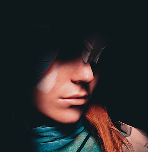 Aloy Close-Up Portrait from Horizon Zero Dawn with Face Paint and Hood HD phone wallpaper