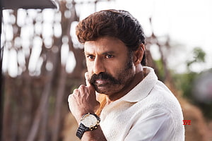 Nandamuri Balakrishna in a contemplative pose wearing a white shirt and wristwatch HD wallpaper