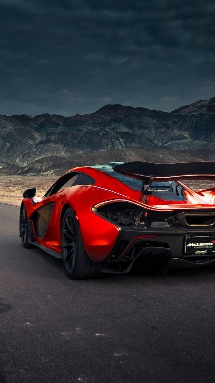 Red McLaren P1 Super Car Rear View on Desert Road Under Stormy Sky HD phone wallpaper