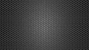 Dark Hexagonal Metal Mesh Texture with Subtle Gradient and Industrial Grid Pattern HD wallpaper