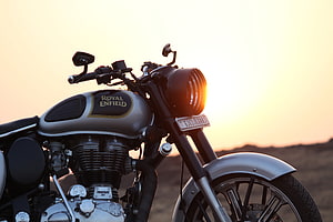 Royal Enfield Classic 350 Motorcycle at Golden Hour Sunset HD wallpaper