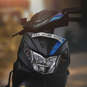 Honda Dio Scooter Front View with Blue Accents and Headlight Detail HD phone wallpaper